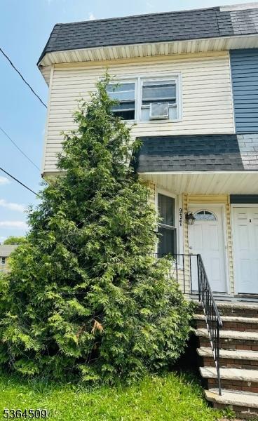 937 S 2nd St, Plainfield City, NJ 07063 - view of front facade featuring roof with shingles
