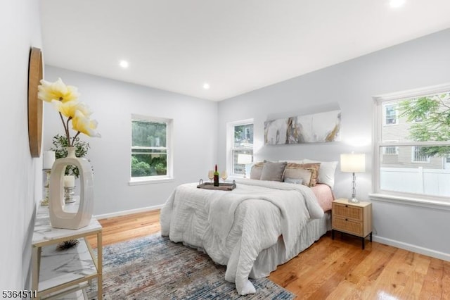 22 Speedway Ave, Newark City, NJ 07106 - bedroom featuring light wood-style floors, multiple windows, and recessed lighting