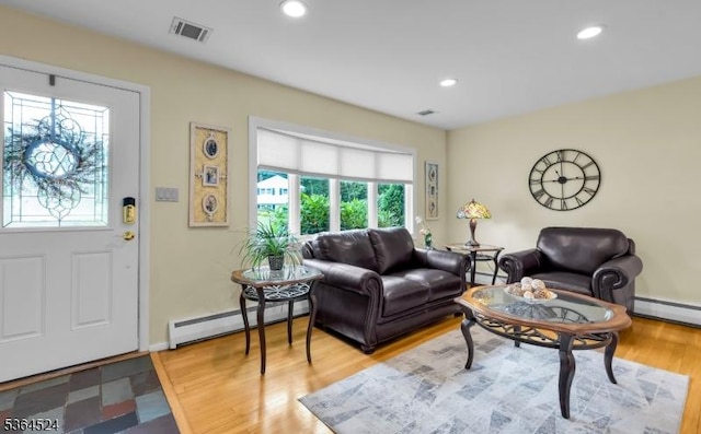 32 Sanford Dr, Randolph Twp, NJ 07869 - living area with a baseboard heating unit, wood finished floors, and recessed lighting