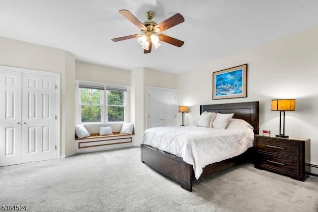 32 Sanford Dr, Randolph Twp, NJ 07869 - bedroom featuring carpet floors, multiple closets, and a ceiling fan