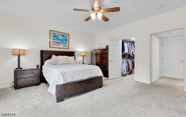 32 Sanford Dr, Randolph Twp, NJ 07869 - bedroom featuring light carpet, a spacious closet, a closet, and a ceiling fan