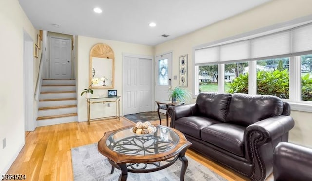 32 Sanford Dr, Randolph Twp, NJ 07869 - living room featuring recessed lighting, light wood-type flooring, and stairs
