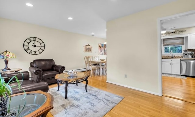 32 Sanford Dr, Randolph Twp, NJ 07869 - living area with light wood-style floors and recessed lighting