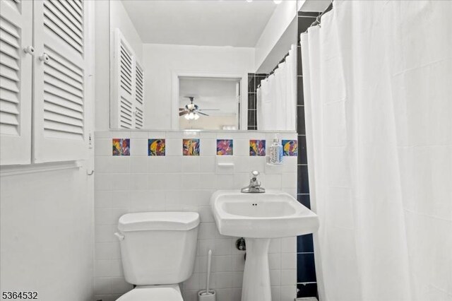 31 Somerville Rd, West Milford Twp, NJ 07421 - bathroom with tile walls, a ceiling fan, and curtained shower