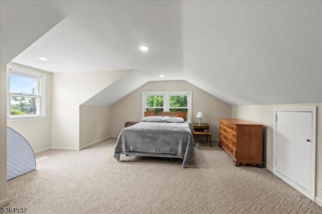 31 Somerville Rd, West Milford Twp, NJ 07421 - bedroom featuring light carpet, multiple windows, vaulted ceiling, and recessed lighting