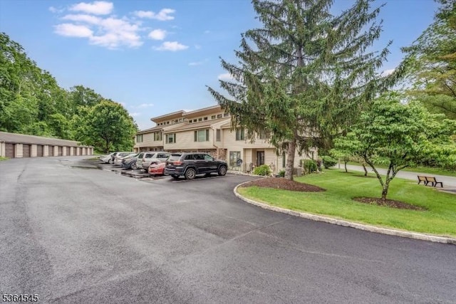 312 Cheyenne Rd Unit 312, Andover Twp, NJ 07848 - view of property featuring uncovered parking