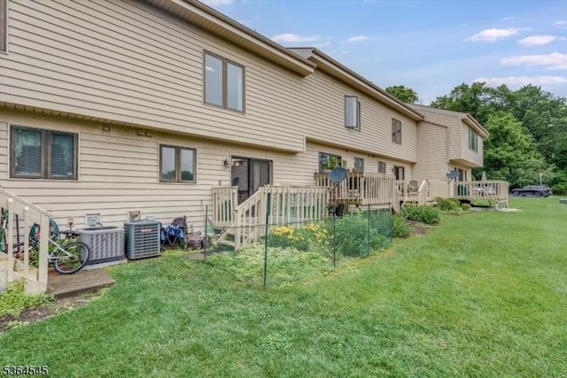312 Cheyenne Rd Unit 312, Andover Twp, NJ 07848 - rear view of house featuring a lawn and a wooden deck