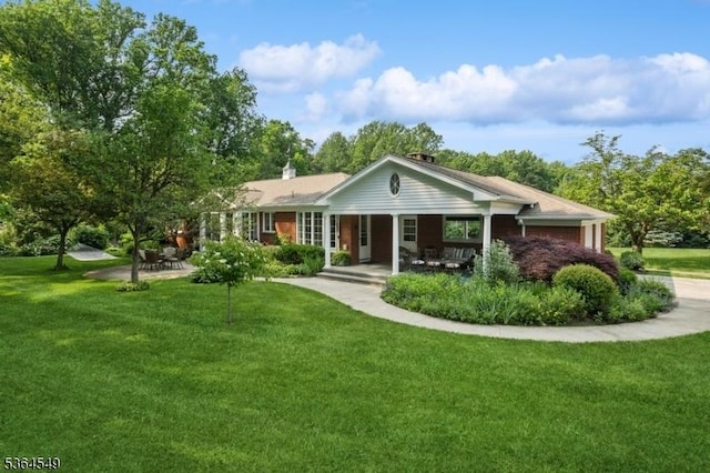 5 Woodland Rd, Franklin Twp, NJ 08867 - single story home with a front lawn and covered porch