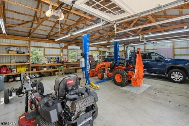 5 Woodland Rd, Franklin Twp, NJ 08867 - garage featuring a garage door opener and a workshop area