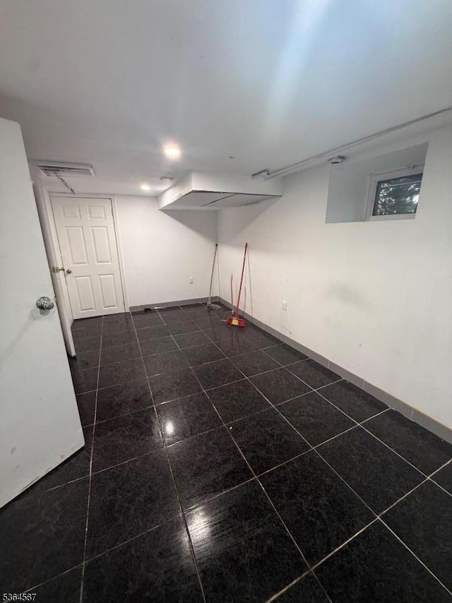 69 Lewis St, Perth Amboy City, NJ 08861 - finished below grade area featuring baseboards