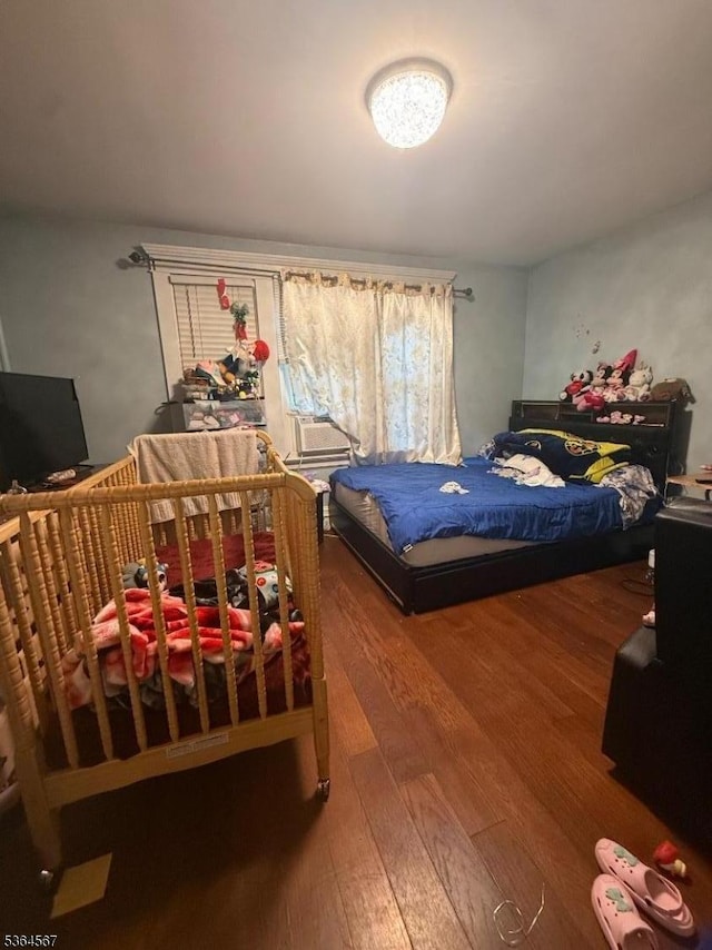 69 Lewis St, Perth Amboy City, NJ 08861 - bedroom featuring wood finished floors and cooling unit