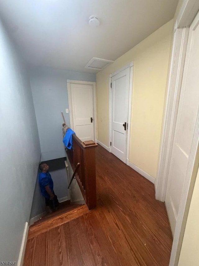 69 Lewis St, Perth Amboy City, NJ 08861 - hall with wood finished floors, an upstairs landing, and attic access