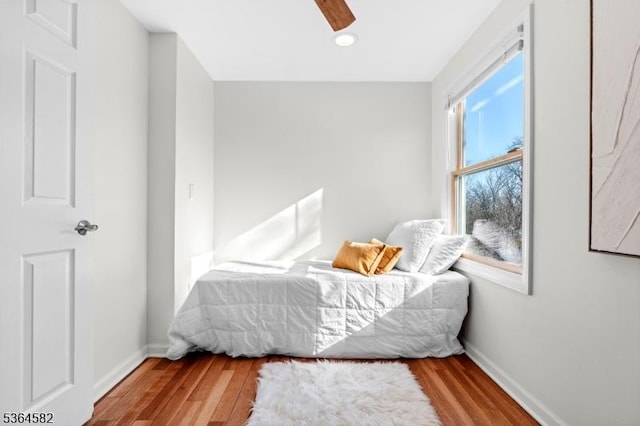 32 Mineral Spring Ave, Passaic City, NJ 07055 - bedroom with wood finished floors and ceiling fan