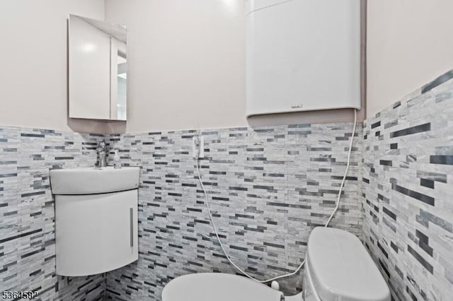 32 Mineral Spring Ave, Passaic City, NJ 07055 - bathroom with toilet and tile walls