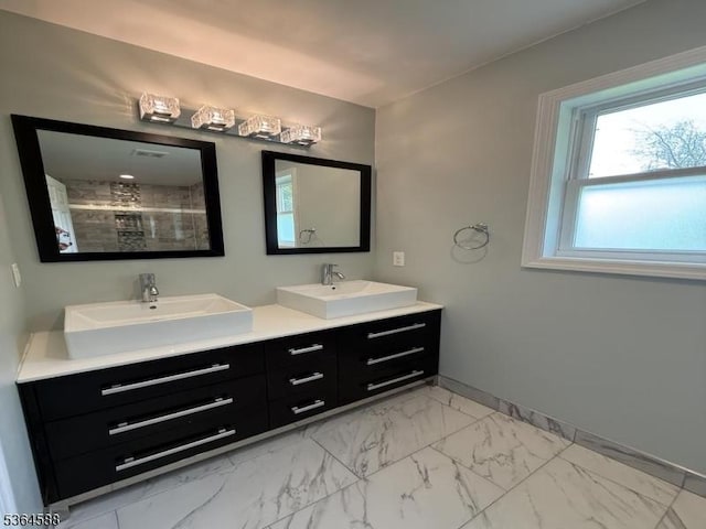 65 Lake Shore Dr, Sparta Twp, NJ 07871 - bathroom with double vanity, marble look tile flooring, and a tile shower