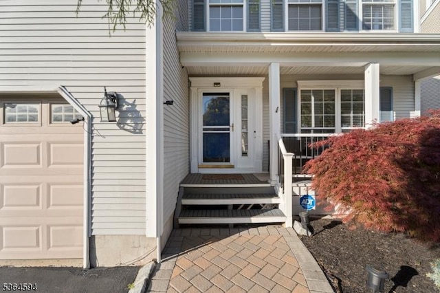 54 Magellan Way, Franklin Twp, NJ 08823 - property entrance featuring covered porch and an attached garage