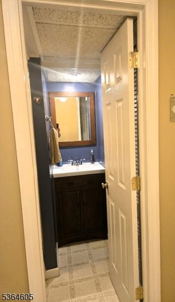 588 Dell Rd, Roxbury Twp, NJ 07850 - half bathroom with vanity