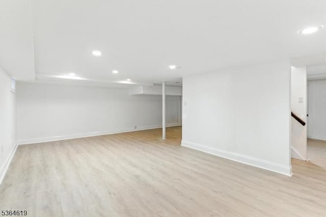 28-30 Reynolds Pl, Newark City, NJ 07106 - finished below grade area with recessed lighting and light wood-style floors