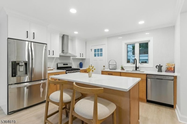 28-30 Reynolds Pl, Newark City, NJ 07106 - kitchen with stainless steel appliances, wall chimney exhaust hood, light wood finished floors, light countertops, and recessed lighting