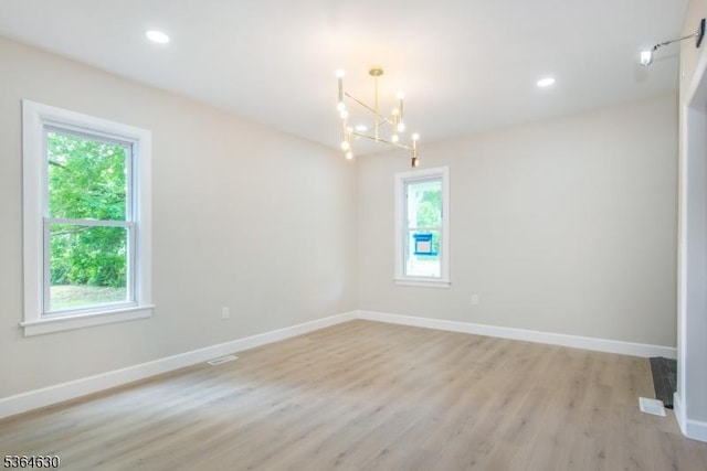 2 New Mashipacong Rd, Montague Twp, NJ 07827 - unfurnished room with healthy amount of natural light, light wood-type flooring, a chandelier, and recessed lighting