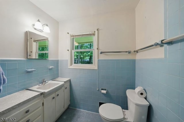 89 Fieldcrest Rd, Parsippany-Troy Hills Twp, NJ 07054 - bathroom with tile walls, tile patterned flooring, vanity, and a wainscoted wall
