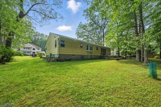89 Fieldcrest Rd, Parsippany-Troy Hills Twp, NJ 07054 - rear view of house with a yard