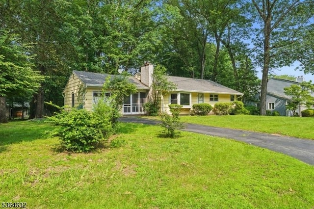 89 Fieldcrest Rd, Parsippany-Troy Hills Twp, NJ 07054 - ranch-style home with a chimney and a front lawn