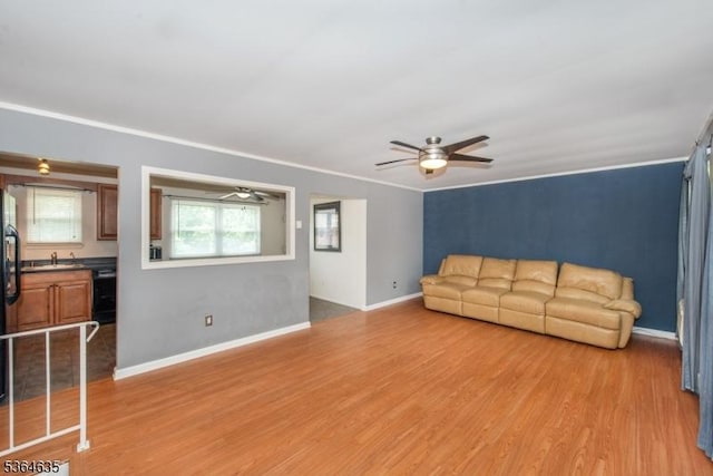322 P7 Richard Mine Rd Unit 7, Rockaway Twp, NJ 07885 - unfurnished living room featuring a ceiling fan, light wood-style flooring, and crown molding