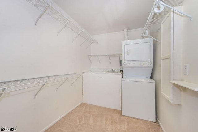 322 P7 Richard Mine Rd Unit 7, Rockaway Twp, NJ 07885 - washroom with stacked washing machine and dryer and light carpet