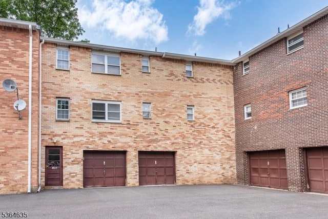322 P7 Richard Mine Rd Unit 7, Rockaway Twp, NJ 07885 - view of property with a garage and driveway