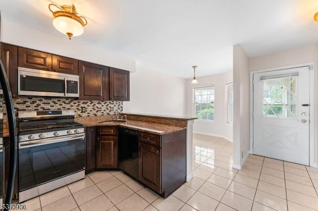 26 Allison Ct, South Brunswick Twp, NJ 08852 - kitchen featuring appliances with stainless steel finishes, backsplash, a peninsula, and dark brown cabinets