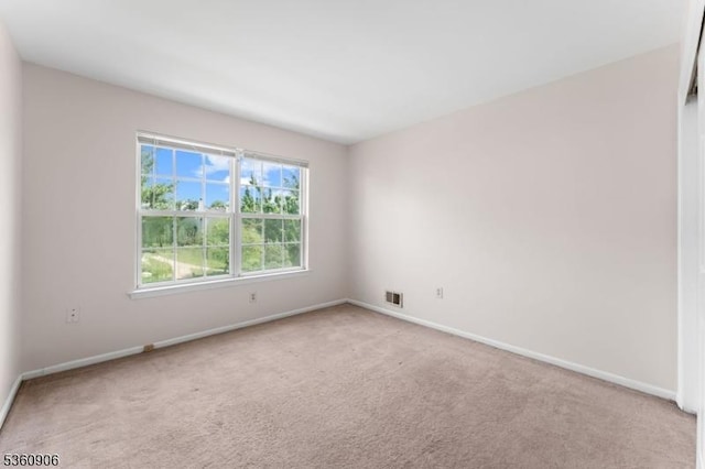 26 Allison Ct, South Brunswick Twp, NJ 08852 - carpeted empty room featuring baseboards