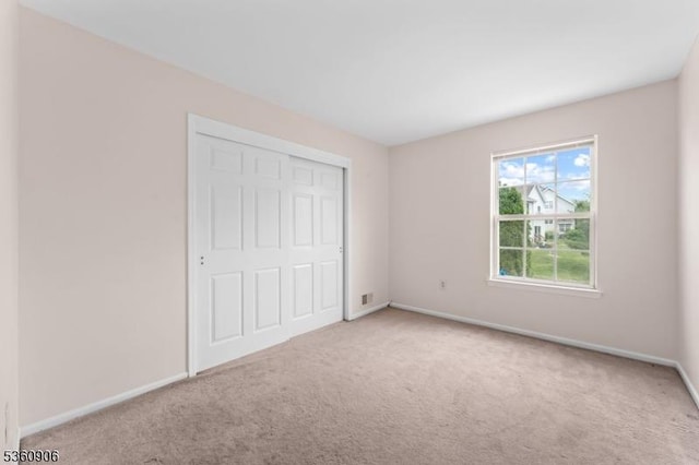 26 Allison Ct, South Brunswick Twp, NJ 08852 - unfurnished bedroom featuring carpet and a closet