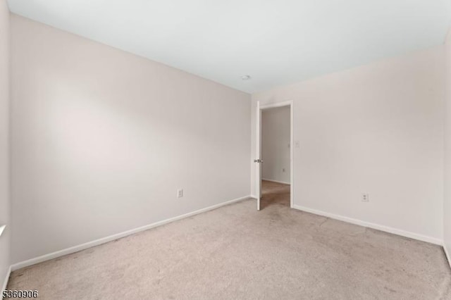 26 Allison Ct, South Brunswick Twp, NJ 08852 - spare room featuring light carpet and baseboards
