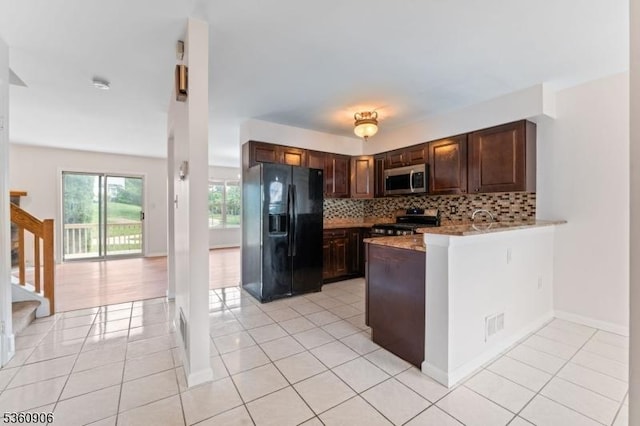 26 Allison Ct, South Brunswick Twp, NJ 08852 - kitchen with appliances with stainless steel finishes, backsplash, light tile patterned flooring, and dark brown cabinets