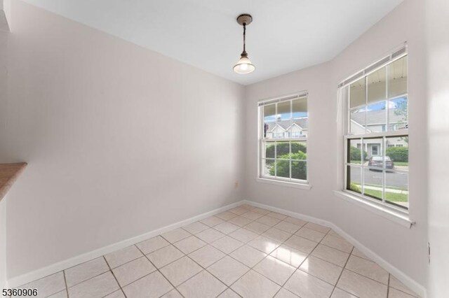 26 Allison Ct, South Brunswick Twp, NJ 08852 - spare room with light tile patterned floors and baseboards
