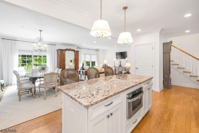 19 Whitney Farm Pl, Morris Twp, NJ 07960 - kitchen with a chandelier, oven, plenty of natural light, light wood-style flooring, and recessed lighting