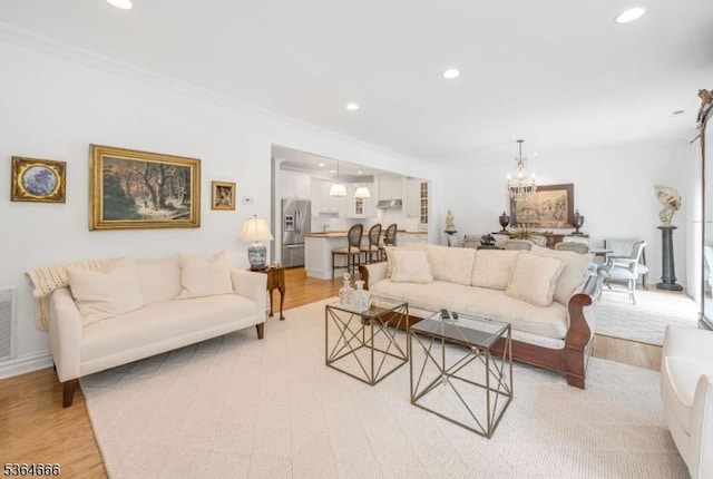 19 Whitney Farm Pl, Morris Twp, NJ 07960 - living room featuring light wood finished floors, recessed lighting, a chandelier, and crown molding