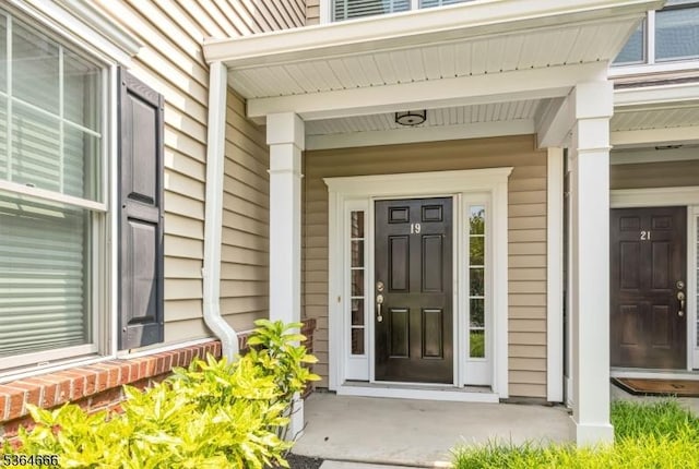 19 Whitney Farm Pl, Morris Twp, NJ 07960 - doorway to property with a porch