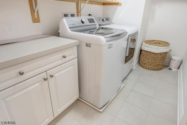 19 Whitney Farm Pl, Morris Twp, NJ 07960 - laundry room featuring washer and dryer, cabinet space, and light tile patterned flooring