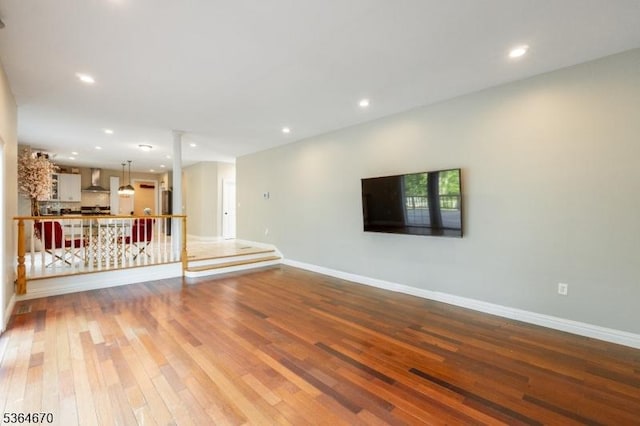 56 Rainbow Hill Rd, East Amwell Twp, NJ 08822 - unfurnished living room with hardwood / wood-style flooring and recessed lighting