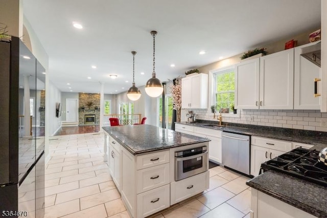 56 Rainbow Hill Rd, East Amwell Twp, NJ 08822 - kitchen with appliances with stainless steel finishes, backsplash, white cabinets, recessed lighting, and open floor plan
