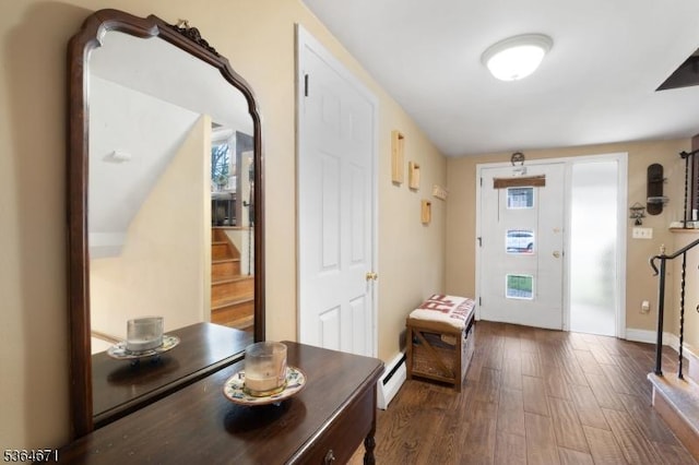 608 Faitoute Ave, Roselle Park Boro, NJ 07204 - foyer featuring stairs, dark wood-type flooring, a baseboard heating unit, and healthy amount of natural light