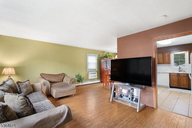 608 Faitoute Ave, Roselle Park Boro, NJ 07204 - living room featuring light wood-type flooring, a baseboard radiator, and an AC wall unit