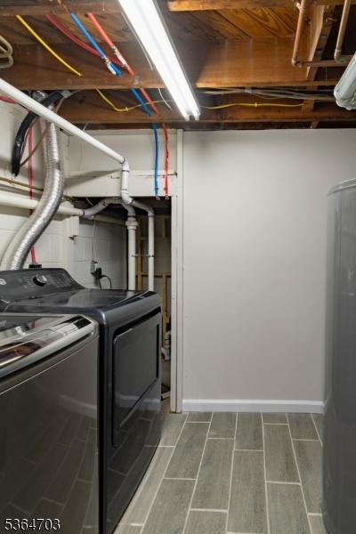 123 Baier Ave, Franklin Twp, NJ 08873 - laundry room with independent washer and dryer and wood finish floors