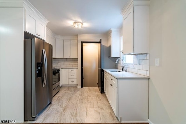 123 Baier Ave, Franklin Twp, NJ 08873 - kitchen with stainless steel appliances, backsplash, white cabinetry, light countertops, and light marble finish flooring