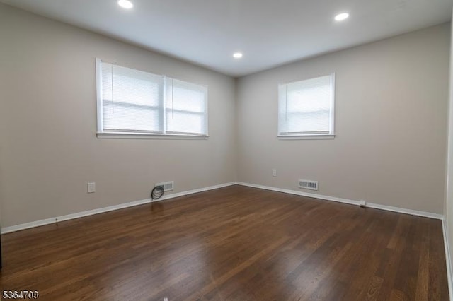 123 Baier Ave, Franklin Twp, NJ 08873 - unfurnished room featuring dark wood-style floors and recessed lighting