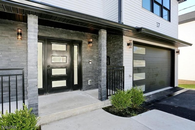17 Mountain Ave, Mahwah Twp, NJ 07430 - doorway to property featuring a porch and a garage