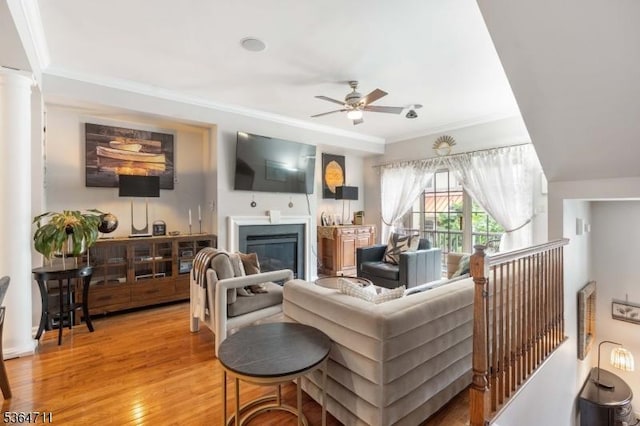746 Green Ln, Union Twp, NJ 07083 - living area with ceiling fan, crown molding, light wood-style flooring, and a glass covered fireplace