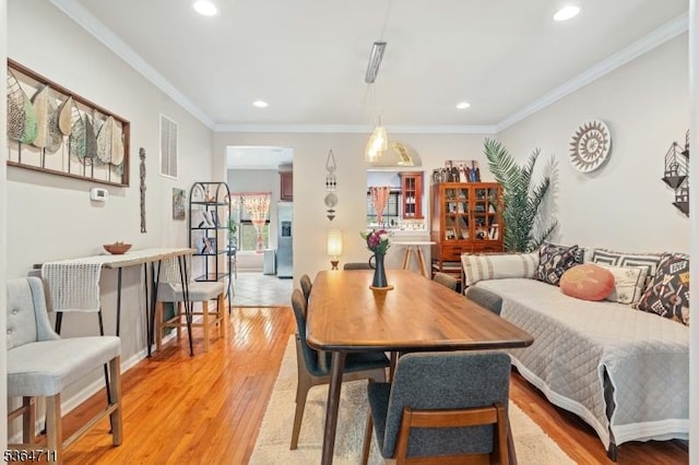 746 Green Ln, Union Twp, NJ 07083 - dining space with light wood finished floors, recessed lighting, and ornamental molding